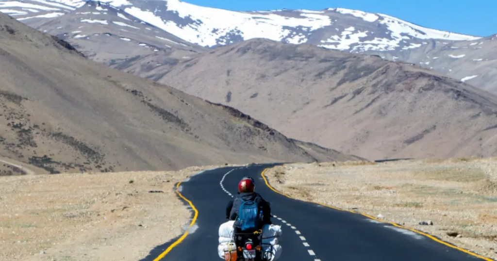 Group of riders on a budget road trip across India exploring scenic mountain highways